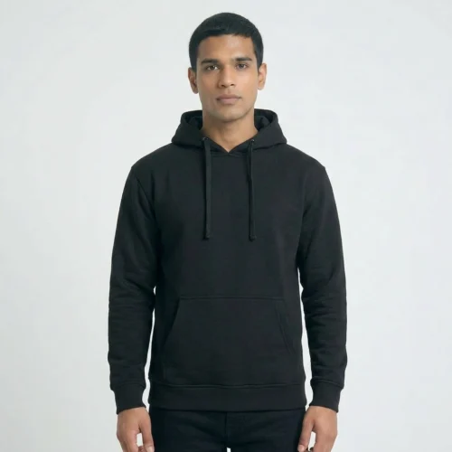 Man wearing a black unisex regular hoodie with hood and drawstrings.